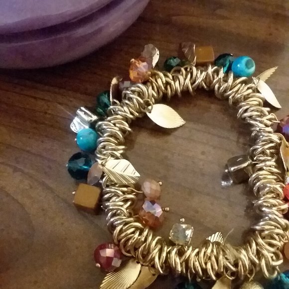 Gold stretch bracelet with charms - Picture 3 of 5